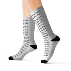 White socks with Sad Sunday Club written on the front
