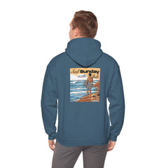 Man wearing a heavy blend hoodie in indigo blue