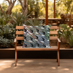 Surfer's Paradise Throw Pillow on wood slatted chair outside